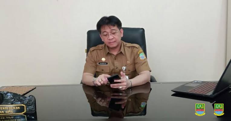 Kepala Dinas Pendudukan dan Pencatatan Sipil Kabupaten Bekasi Hudaya. (Foto: Dok Net/ Istimewa)