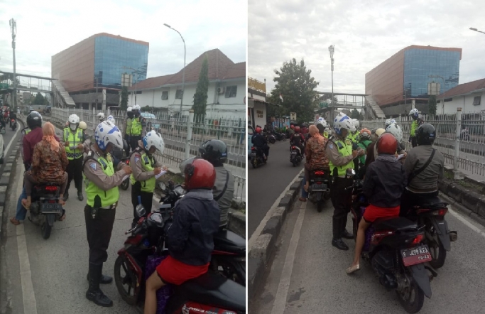 Pengendara motor terjaring Operasi Patuh Jaya saat nekat melintas di Jalur Busway. (Foto: PMJ News/Twitter TMC Polda Metro Jaya).