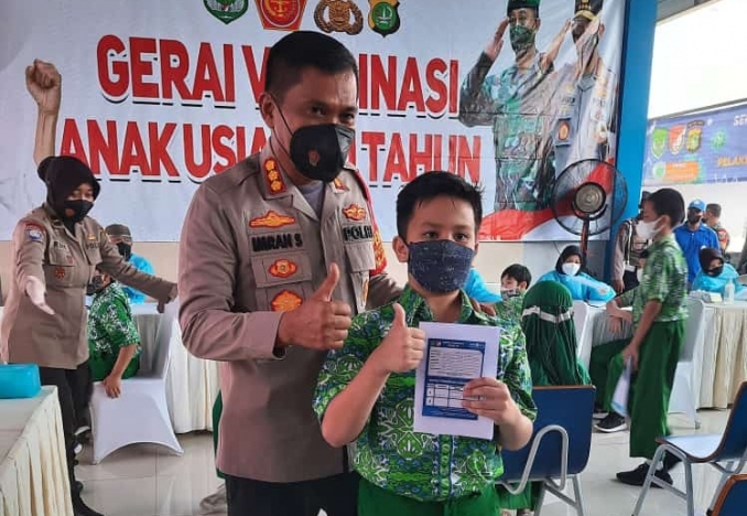 Polres Metro Depok melaksanakan vaksinasi untuk anak usia 6-11 tahun. (Foto: PMJ News).