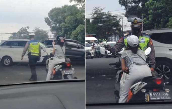 Viral seorang wanita pengendara motor mengacungkan jari tengahnya saat ditegur anggota polisi. (Foto: PMJ News/Tangkapan Layar)