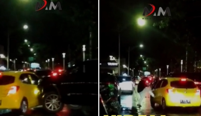 Video aksi arogan pengemudi Fortuner yang menabrak dan mengancam sopir mobil Brio warna kuning viral di media sosial. (Foto: PMJ News/Twitter)