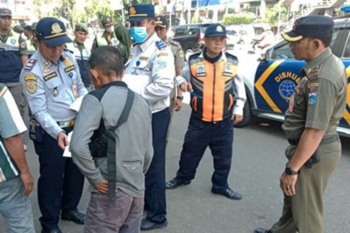 Penindakan terhadap juru parkir liar di Pasar Senen Jakarta Pusat. (Foto: PMJ/Ist/Ilustrasi). 