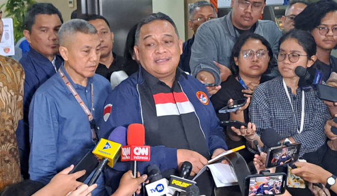 Kepala Badan Perlindungan Pekerja Migran Indonesia, Benny Rhamdani hadir di Bareskrim Polri. (Foto: PMJ News/Fajar)