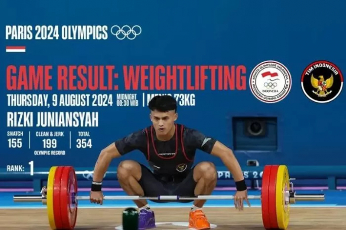 Atlet Indonesia Rizki Juniansyah cabang angkat besi pada nomor 73 kilogram putra dapat emas. (Foto: PMJ/Timindonesiaofficial).